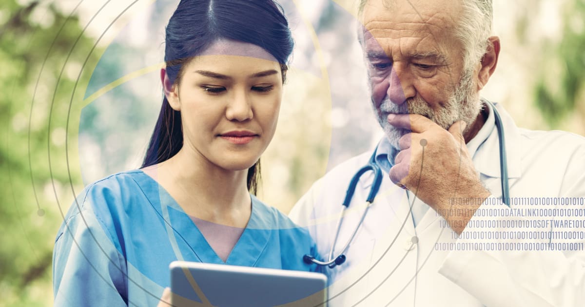 Doctor and nurse discussing medical notes on tablet