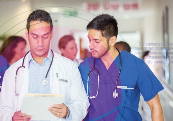 Doctor reviewing medical charts in a hospital